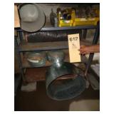 Two shelves: duct work, pipe fittings