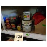 Shelf: Havoline oil, paint cups