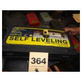 Self-leveling laser level/tripod/case