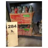 Coca-Cola bottles/cases
