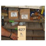 Three shelves: brass, copper valves/fittings