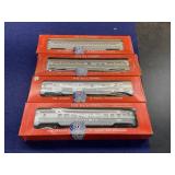 4 HO by Lionel railroad cars Santa Fe
