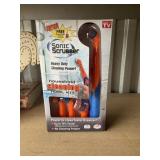 Sonic scrubber cleaning