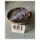 Tin of buttons