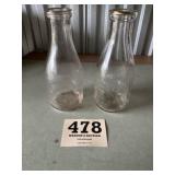 two embossed milk bottles one is shamokin