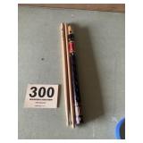 Two drumsticks and wooden flute