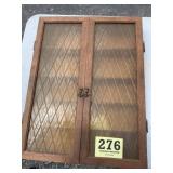 Vintage medicine cabinet with anchor door