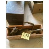Wooden box with coal shovel and screw jack