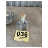 Salt and pepper shakers one Tupperware