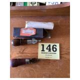 Two automatic awls