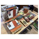 Lot of new sandpaper and belts