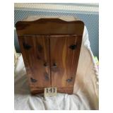 Doll clothes, cedar closet with contents