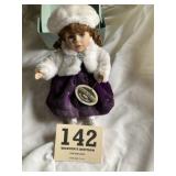 Porcelain doll music box