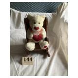 Teddy bear on rocking chair