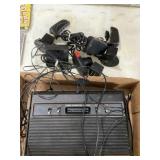 Atari vintage gaming console with controllers