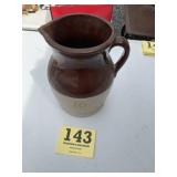Brown top pitcher