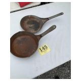 Two steel frying pans