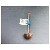 Brown soup ladle