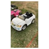 Childï¿½s driving Corvette