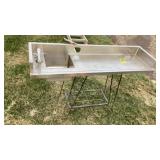 Stainless steel sink for meat cutting