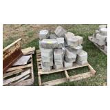 Skid of retaining wall block