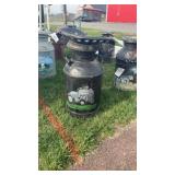 Milk can with tractor seat