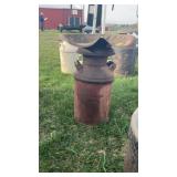 Milk can with tractor seat