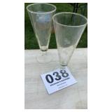 Two pilsner glasses