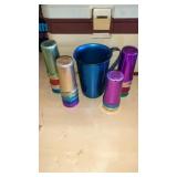 Aluminum, pitcher and multicolored glasses set