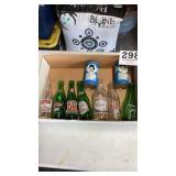 Soda bottles, and Phillies, RC cans