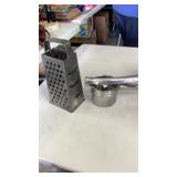 Food grater and press