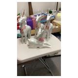 4 papier-mché deer