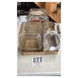 Glass candy jar, two plastic fireball containers