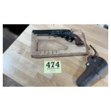 Old mid-century modern style ashtray with a gun