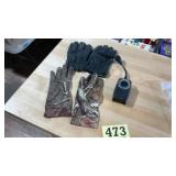 Menï¿½s glove and an outdoor timer