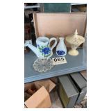 Flower pitcher has a chip, vase, ashtray, candy