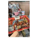 Coca Cola tray and elephant and a deck of cards