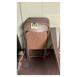 Four metal folding chairs