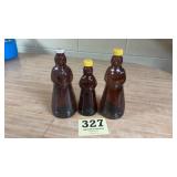 Three old glass and  Aunt Jemima bottles