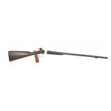 antique black powder side-by-side shotgun.