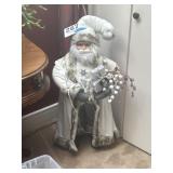 Santa Claus plug-in and light up approximately 3