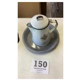Granite pie plate and enamel teapot
