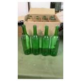 12 green beverage bottles