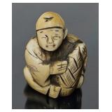 Antique Japanese Ivory Netsuke of Merchant