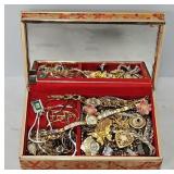 Red Jewelry Box Filled with Jewelry and Watches