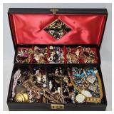 Black Jewelry Box Filled with Jewelry and Watches
