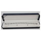 Sterling Silver Blue Topaz Bracelet & Earring Set