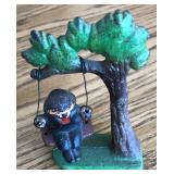 CAST IRON BOY ON SWING CAST IRON BOY ON SWING