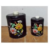 2 VINTAGE BLACK DECORATED CANISTERS 2 VINTAGE BLACK DECORATED CANISTERS