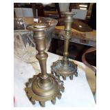 unusual brass candle sticks